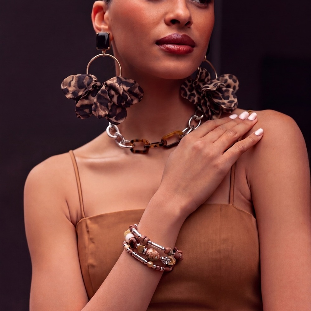 Paparazzi Leopard-Print Earrings with matching multi piece stretch bracelet.